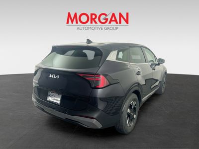 2026 Kia Sportage — rear three-quarter view