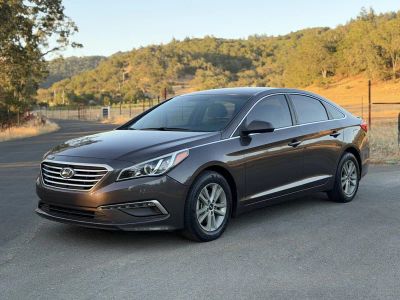 2015 Hyundai Sonata in Brown — front three-quarter view