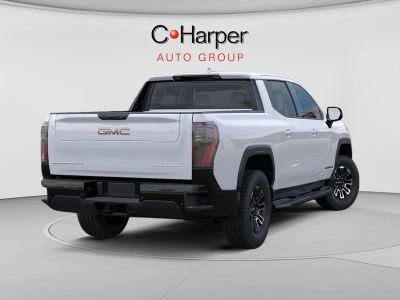 2026 GMC Sierra EV — rear three-quarter view