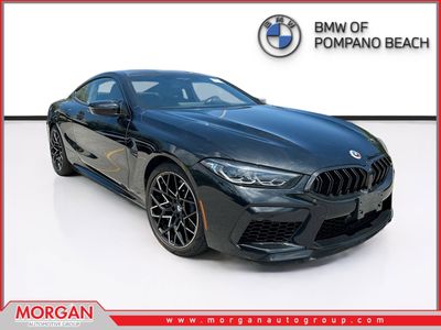 2024 BMW M8 Competition in Black Sapphire Metallic — front three-quarter view