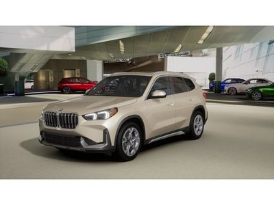 2026 BMW X1 xDrive28i in Dune Grey Metallic — front three-quarter view
