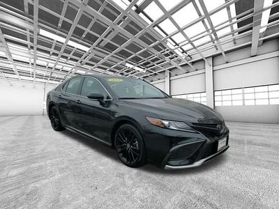 2023 Toyota Camry XSE in Black — front three-quarter view