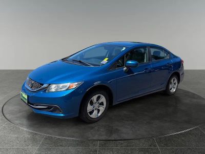 2015 Honda Civic — rear three-quarter view