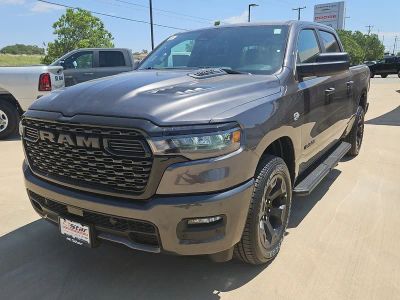 2026 RAM 1500 Express in Granite Crystal Metallic Clearcoat — front three-quarter view