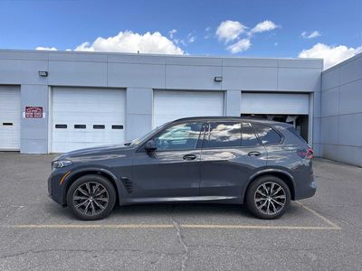 2024 BMW X5 xDrive40i — rear three-quarter view