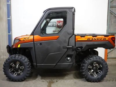 2026 Polaris® Ranger XP 1000 NorthStar Premium Orange Rust — front three-quarter view