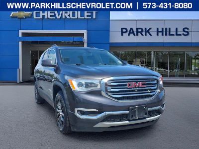 2017 GMC Acadia SLT in Iridium Metallic — front three-quarter view