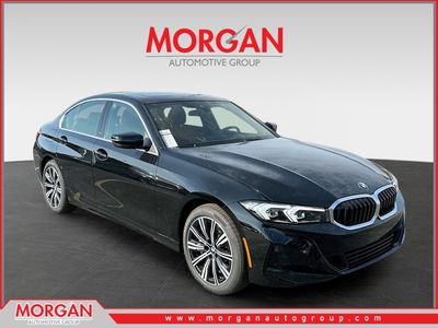 2026 BMW 3 Series 330i in Black — front three-quarter view