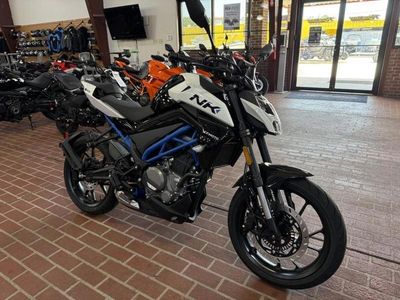 2025 CFMOTO 300NK in WHITE — front three-quarter view