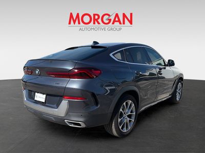 2022 BMW X6 — rear three-quarter view