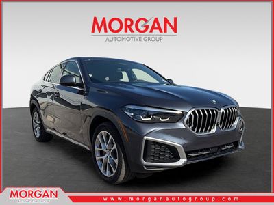 2022 BMW X6 xDrive40i in Arctic Gray Metallic — front three-quarter view