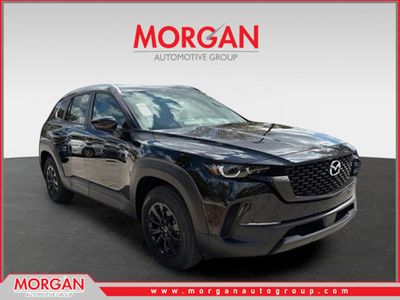 2026 Mazda CX-50 Hybrid Preferred in Jet Black Mica — front three-quarter view