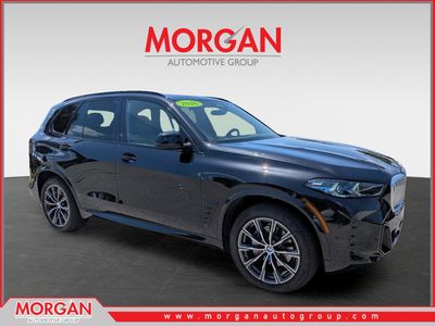 2026 BMW X5 sDrive40i in Black Sapphire Metallic — front three-quarter view