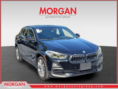 2019 BMW X2 sDrive28i in Jet Black — front three-quarter view