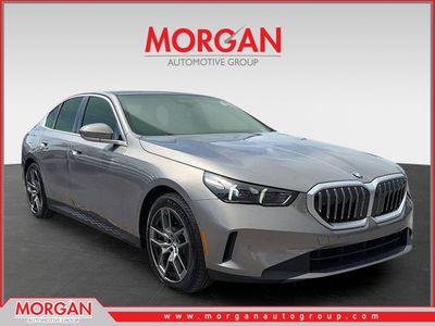 2026 BMW 5 Series 530i in Gray — front three-quarter view