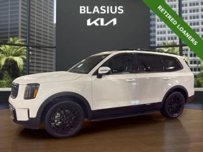 2025 Kia Telluride EX X-Line in Glacial White Pearl — front three-quarter view