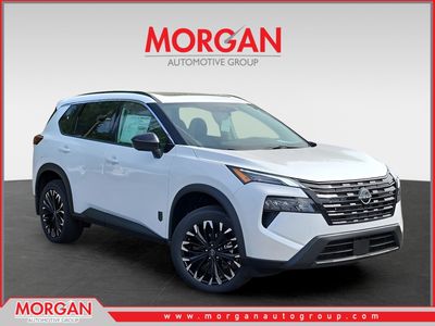 2026 Nissan Rogue Dark Armor in White — front three-quarter view