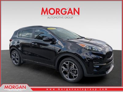 2020 Kia Sportage SX Turbo in Black Cherry Pearl — front three-quarter view