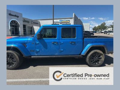 2025 Jeep Gladiator Nighthawk in Hydro Blue Pearlcoat — front three-quarter view