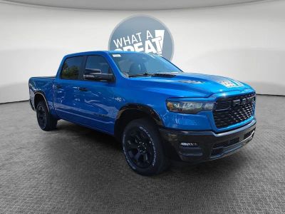 2026 RAM 1500 Big Horn/Lone Star in Hydro Blue Pearlcoat — front three-quarter view