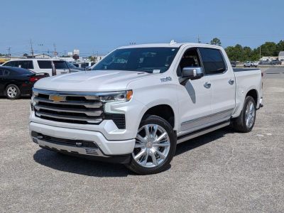 2024 Chevrolet Silverado 1500 High Country in Beige — front three-quarter view