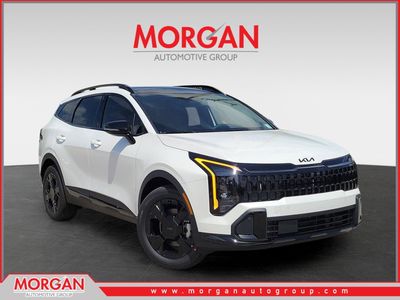 2026 Kia Sportage Hybrid X-Line in Snow White Pearl — front three-quarter view