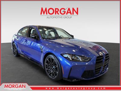 2025 BMW M3 Competition xDrive in Portimao Blue Metallic — front three-quarter view