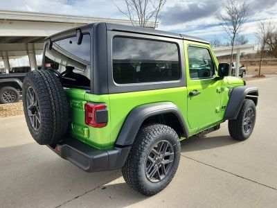 2026 Jeep Wrangler — rear three-quarter view