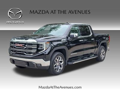 2022 GMC Sierra 1500 SLT in Black — front three-quarter view