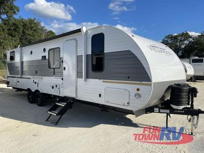 2026 Forest River RV Wildwood X-Lite — rear three-quarter view