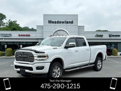 2022 RAM 2500 Laramie in Bright White Clearcoat — front three-quarter view