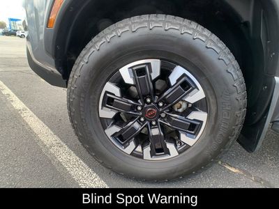 2024 Nissan Frontier PRO-4X 32414 — front three-quarter view
