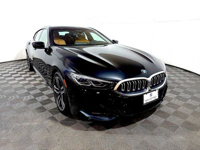 2024 BMW 840i xDrive 840i in Black Sapphire Metallic — front three-quarter view
