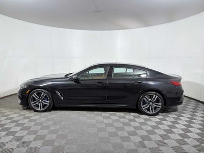 2024 BMW 840i xDrive — rear three-quarter view