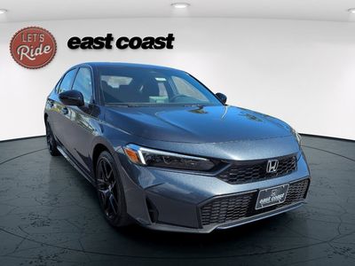 2026 Honda Civic Hybrid — rear three-quarter view