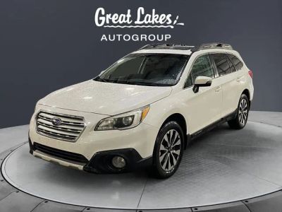 2016 Subaru Outback 2.5i Limited in Crystal White Pearl — front three-quarter view