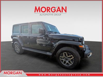 2025 Jeep Wrangler Sahara in Black — front three-quarter view