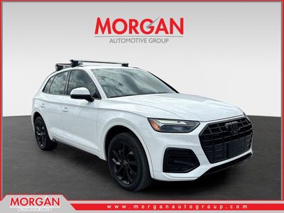 2021 Audi Q5 Premium Plus in Ibis White — front three-quarter view