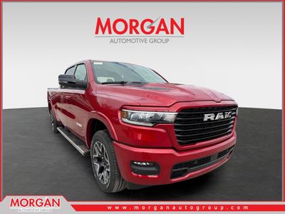 2026 Ram 1500 Laramie in Molten Red Pearlcoat — front three-quarter view