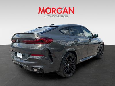 2026 BMW X6 — rear three-quarter view