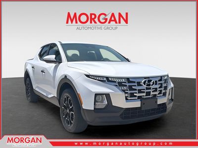 2022 Hyundai Santa Cruz SEL in Ice White — front three-quarter view
