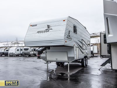 2007 Fleetwood RV Mallard — rear three-quarter view