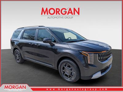 2026 Kia Carnival Hybrid EX in Panthera Metal — front three-quarter view