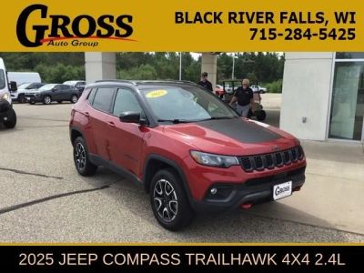 2025 Jeep Compass Trailhawk in Red Hot Pearlcoat — front three-quarter view