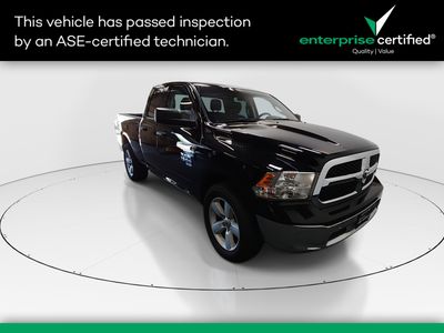 2024 Ram 1500 Classic SLT 4x4 Quad Cab 6'4" Box — front three-quarter view