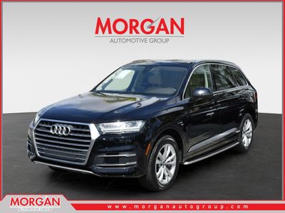 2019 Audi Q7 Premium Plus in Orca Black Metallic — front three-quarter view