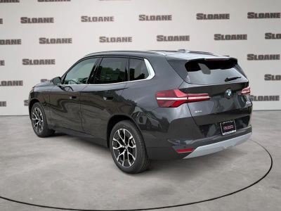 2026 BMW X3 — rear three-quarter view