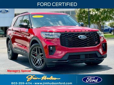 2025 Ford Explorer ST CERTIFIED PANO ROOF MULTICONTOUR SEATS in Red Metallic — front three-quarter view