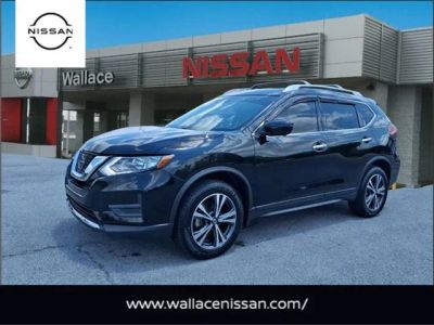 2019 Nissan Rogue SV in Magnetic Black Pearl G41 — front three-quarter view