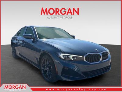 2025 BMW 3 Series 330i in Blue — front three-quarter view